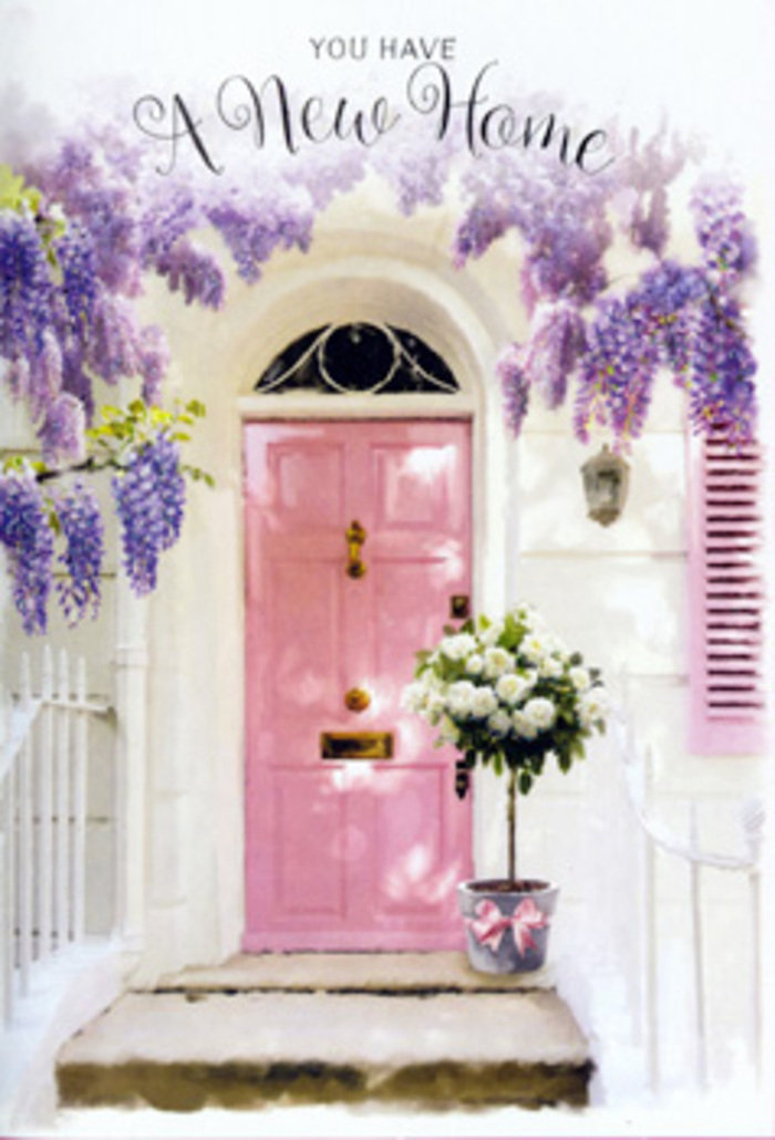 The photograph presents a serene Southgate entryway where every detail seems to tell the story of new beginnings. A pale pink front door, painted in a soft, matt finish, stands at the centre, its surface catching diffused daylight that gives it a mellow, welcoming glow. Above and around it, wisteria trails in thick, romantic swags; the flowers are a dreamy lavender, suspended in clusters that drift downward like scented veils, brushing the whitewashed wall and partly framing a softly toned shutter. The colours are gentle and cohesive, reminiscent of quiet residential streets near Grovelands Park, where gardens spill quietly over garden walls and seasonal blooms surprise you around each corner. On the doorstep sits a stylish tin bucket in a subtle grey, clearly chosen to let the flowers shine. From it, a lush bouquet rises: white and creamy roses in full, rounded heads, their petals creamy and almost luminous, intertwined with fresh greenery that adds texture and a hint of woodland character. A satin ribbon in dusky pink encircles the base of the bucket, catching the eye as a delicate finishing touch, tying together door, blossoms, and bouquet in one pastel melody. You can almost imagine the gentle rustle of the wisteria in a soft breeze and the faint mingling of floral scents as someone pauses with a key in hand. The mood is tender and hopeful, ideal for congratulating a friend or family member on their new Southgate home, perhaps along Chase Side or near the local cafés, and for making that first step across the threshold feel instantly embraced by warmth, affection, and the promise of lasting memories.